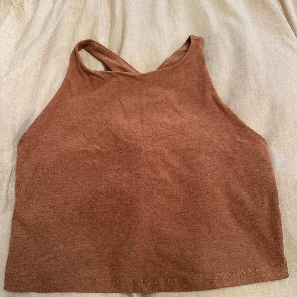 Beyond Yoga Copper Sleeveless Top and bottom set used.


XL top and L bottom